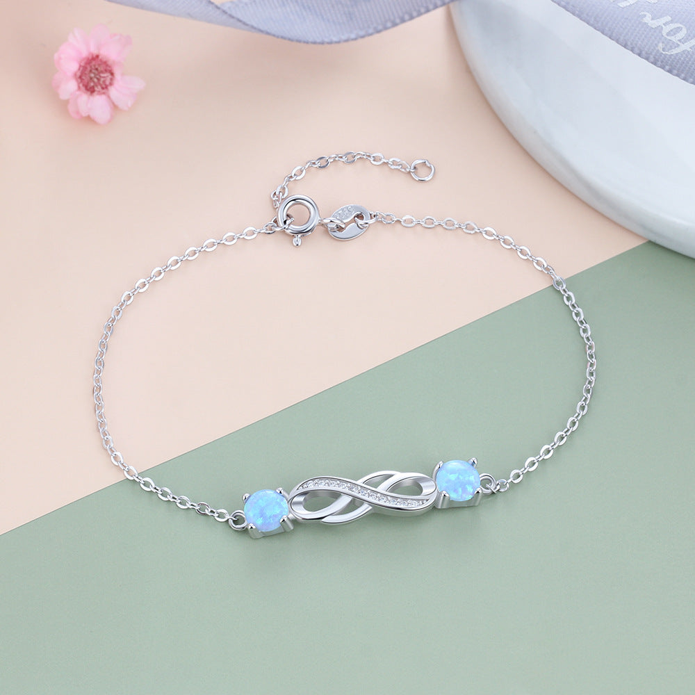 Twist Zircon Infinite Symbol with Double Blue Round Opal Sterling Silver Bracelet