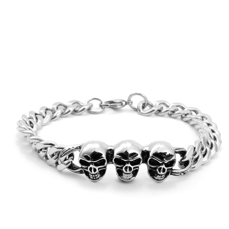 Men's Bold Titanium Steel Triple Skull Bracelet - Unique Rough Cast Accessory