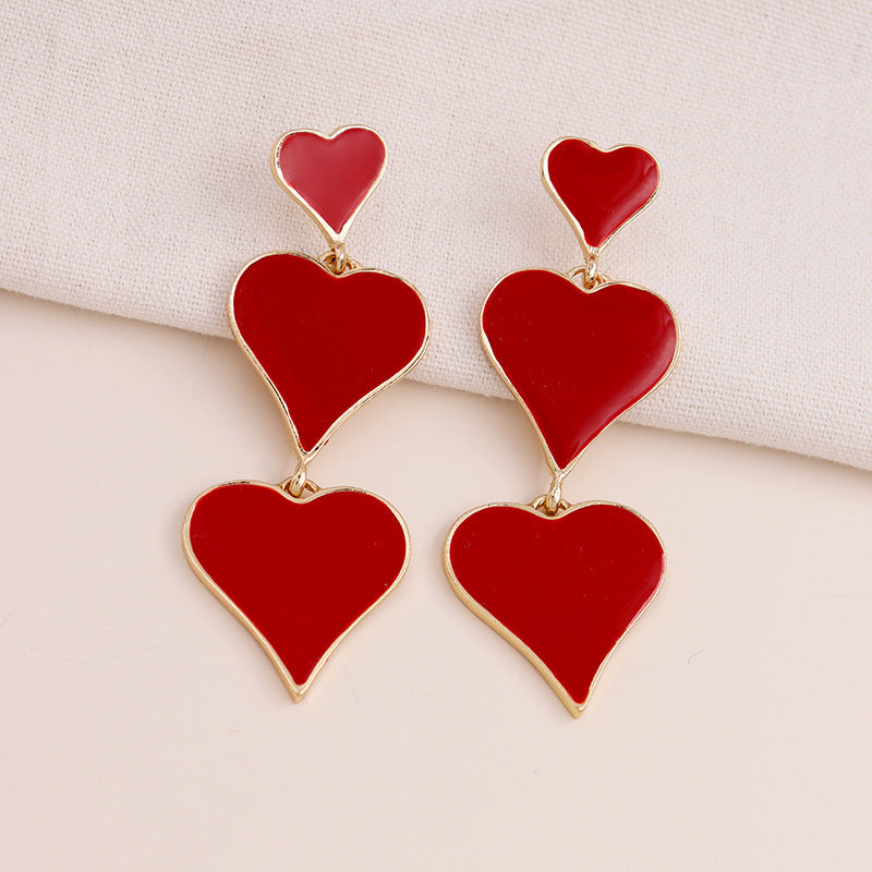 Exaggerated Red Peach Heart Earrings with European Charm