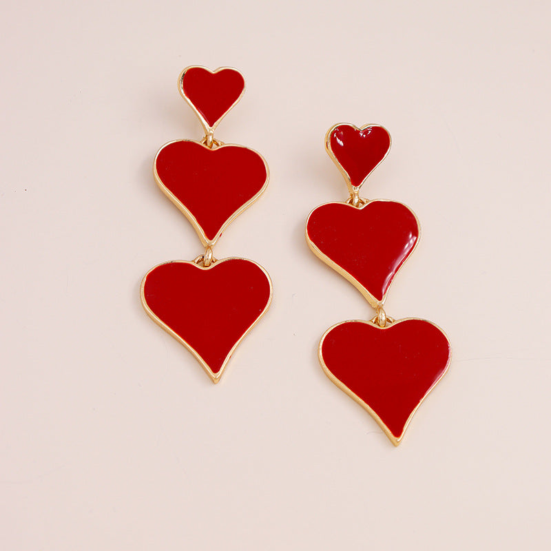 Exaggerated Red Peach Heart Earrings with European Charm