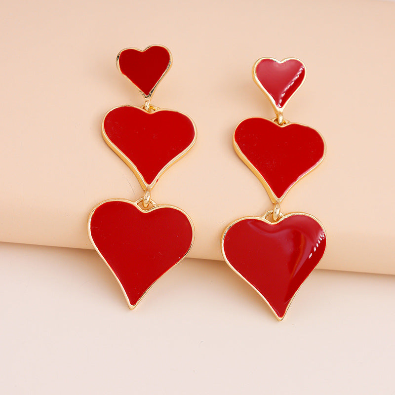 Exaggerated Red Peach Heart Earrings with European Charm