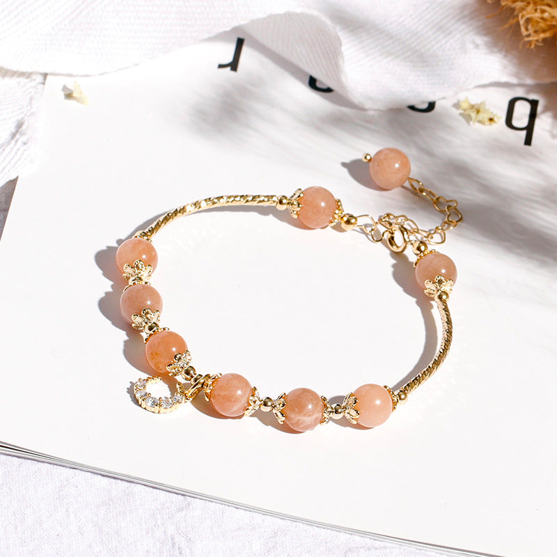 Fortune's Favor Sterling Silver Bracelet with Orange Sunstone and Zircon Moon Beads