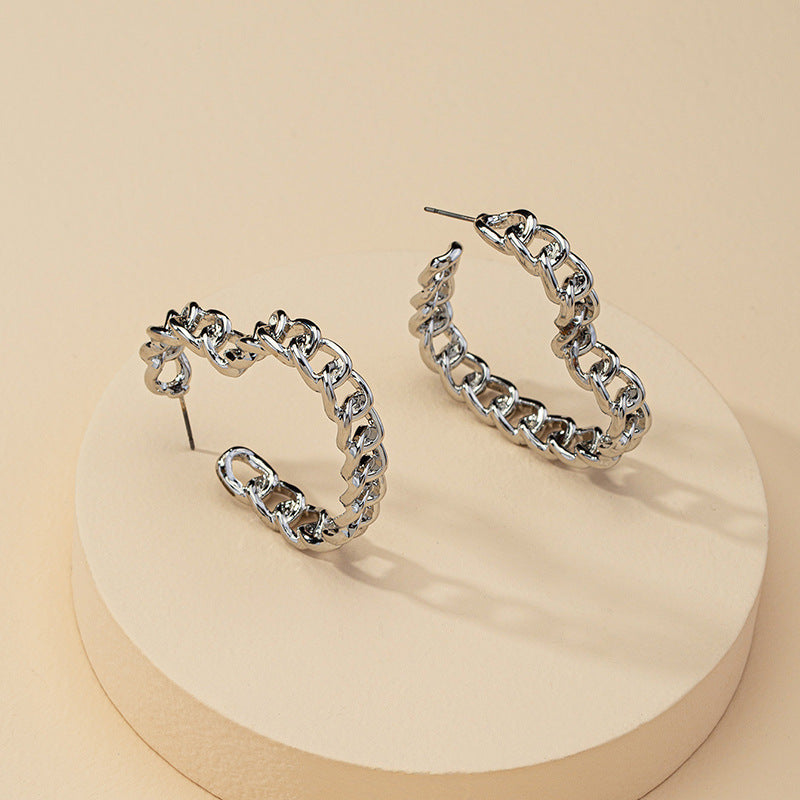 Inventive Vienna Verve Metal Love Earrings with Geometric Design