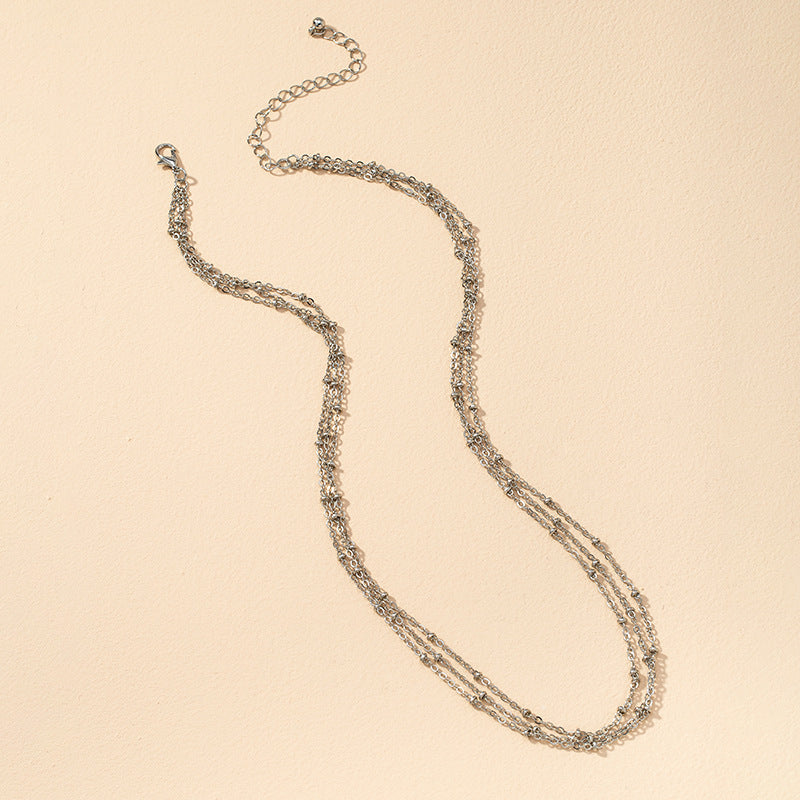 Trendy Metal Three-Layer Necklace with Minimalist Flair - Vienna Verve Collection