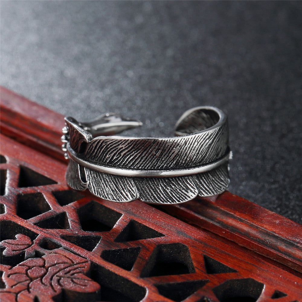 Retro Titanium Steel Ring with Feather Design