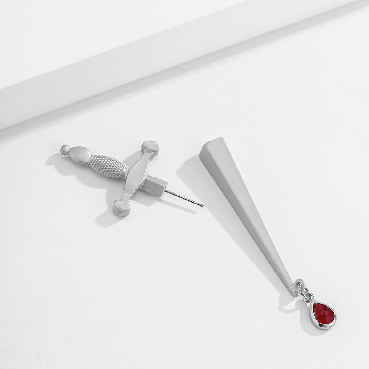 Fashionable Single Earring with Unique Sword Shaped Blood Drop Gemstone