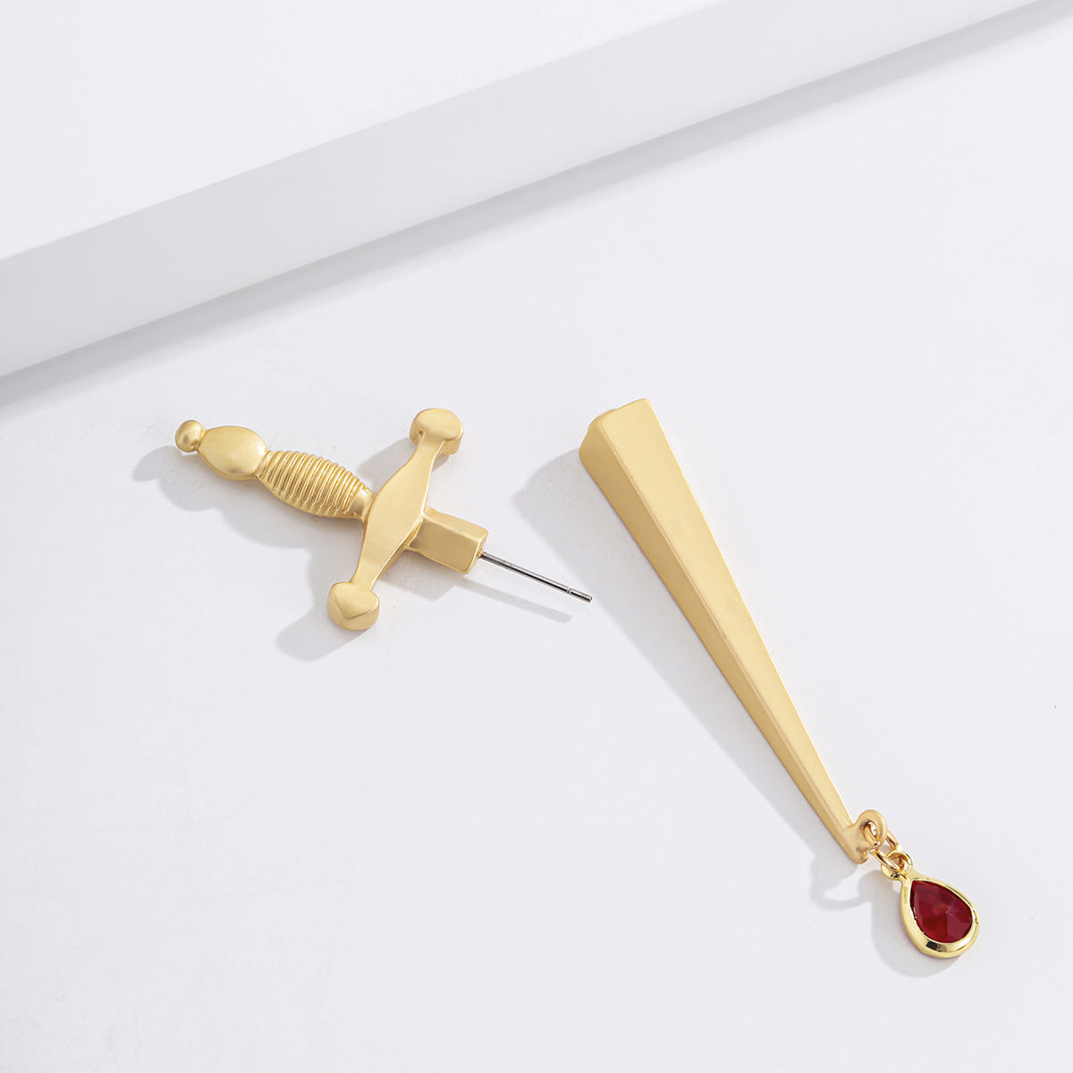 Fashionable Single Earring with Unique Sword Shaped Blood Drop Gemstone