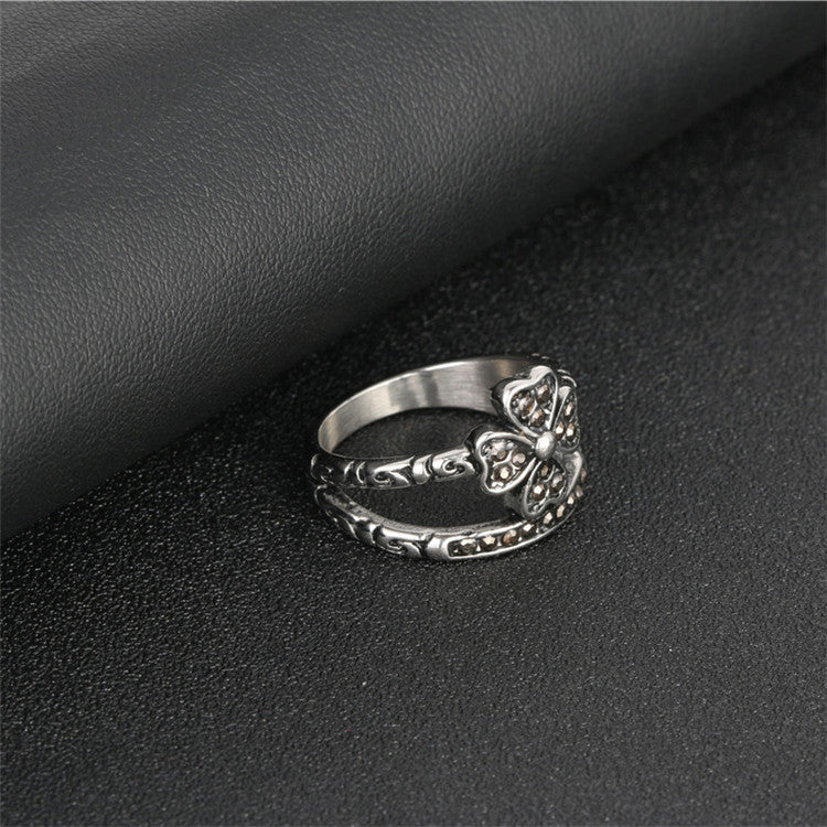 Punk-Inspired Four-Leaf Clover Titanium Steel Ring with Black Zircon Accents for Men and Women