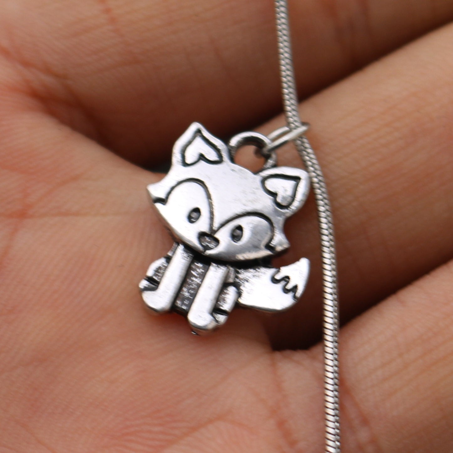 Elegant Fox Pendant Necklace with Wave Design