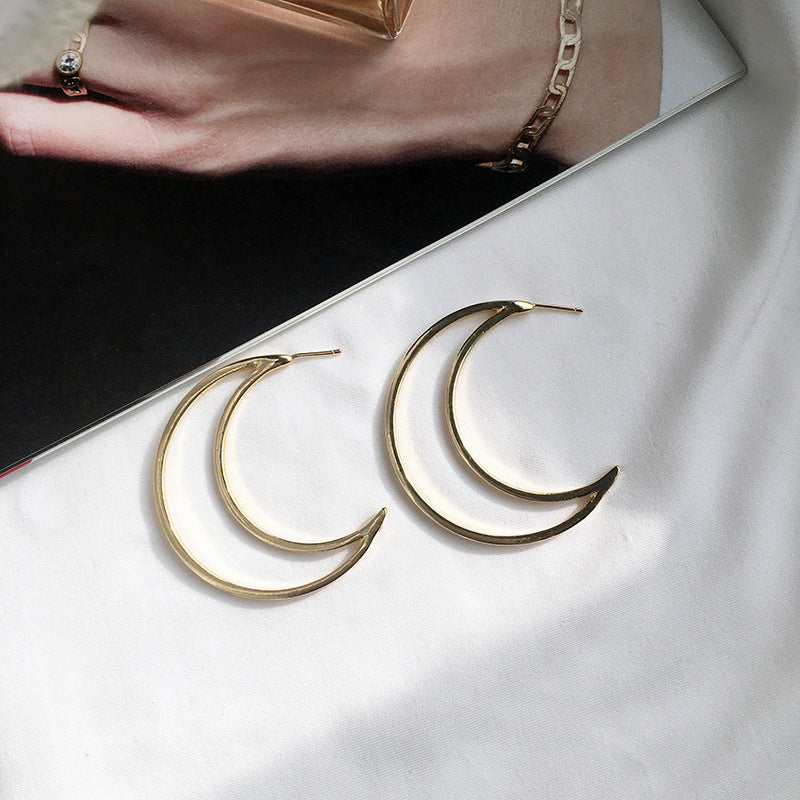 Shimmering Night Sky Crescent Earrings with Geometric Touch