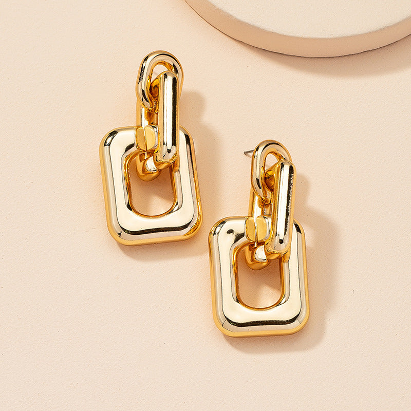 Golden Geometric Earrings with a Creative Twist for Stylish Women