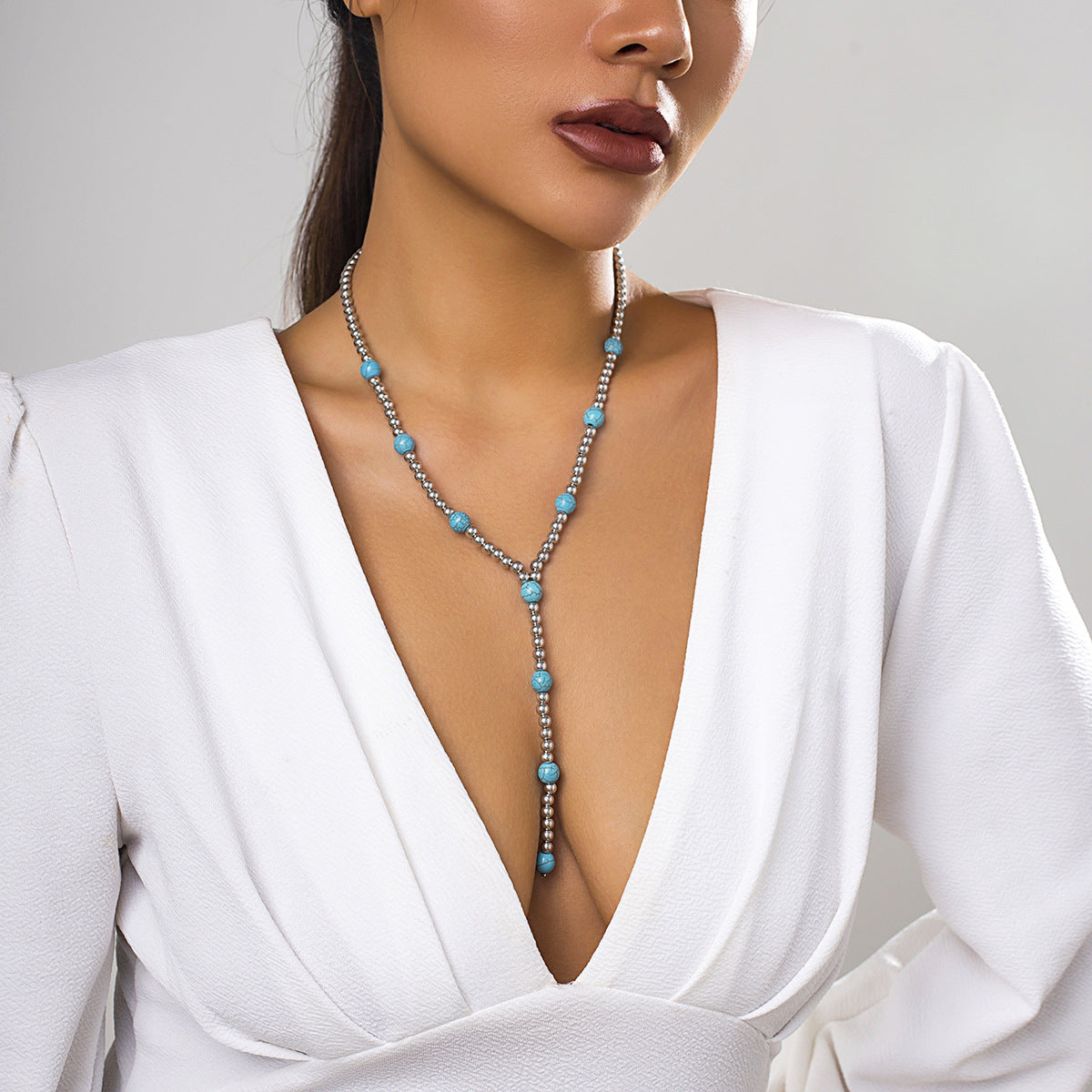 Chic Turquoise Tassel Necklace Featuring a Geometric Design