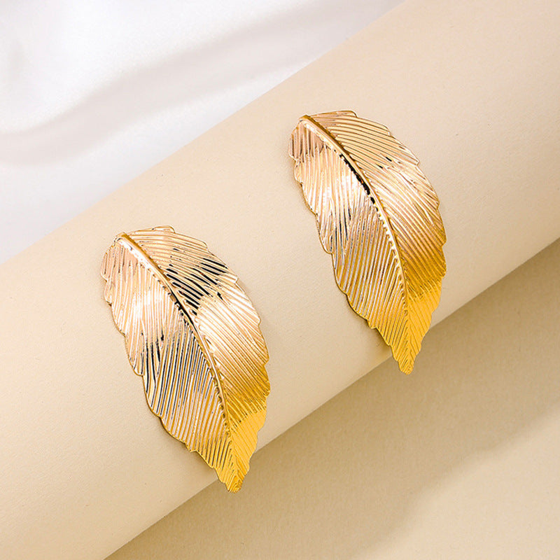 Feathered Metal Leaf Earrings with a Vintage Vibe