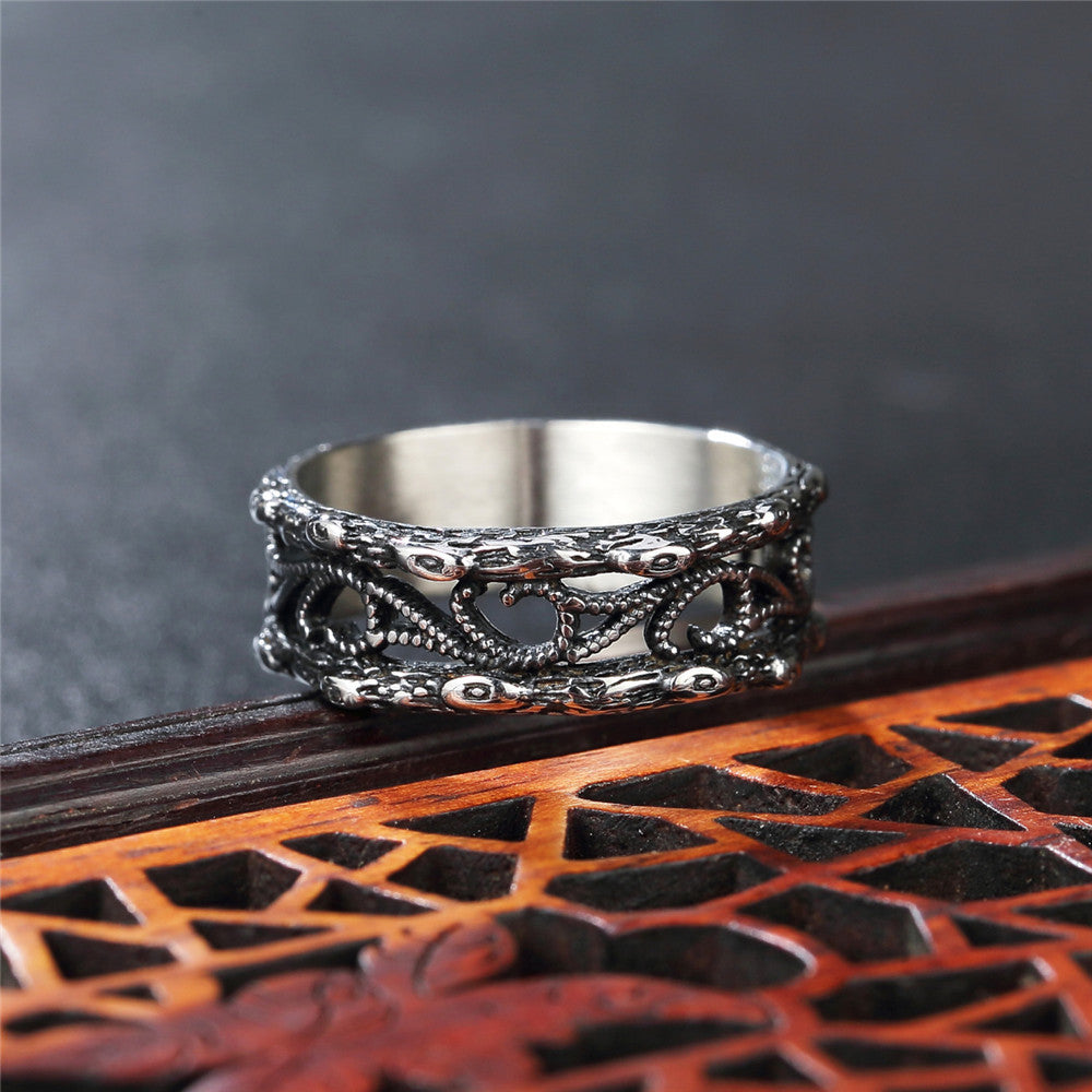 European and American Retro Hollow Tongue Carved Titanium Steel Ring