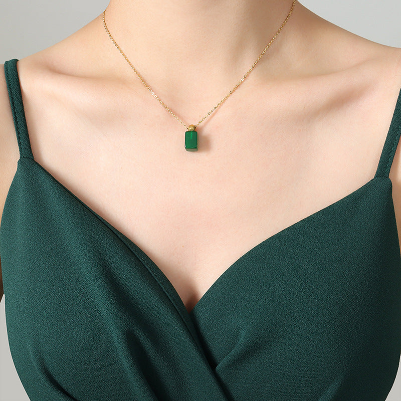 Emerald Glass Pendant Necklace with a Vintage Twist in Gold-Plated Titanium Steel