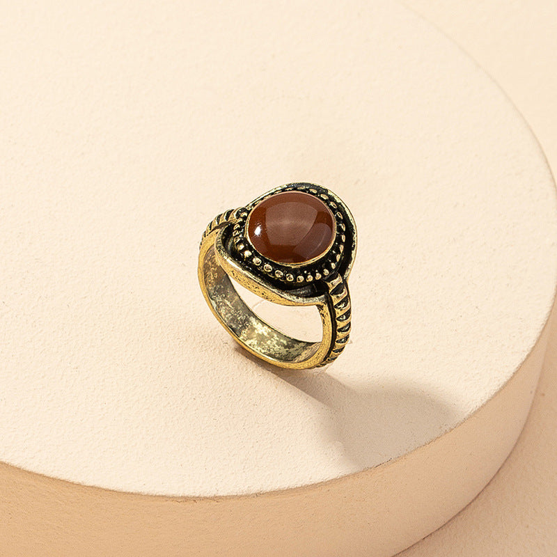 Exquisite Carved Tiger's Eye Ring with Vintage Red Wine Hue