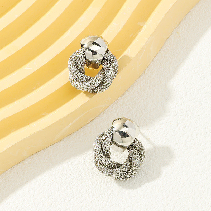 Luxurious Snakeskin Roll Shape Metal Stud Earrings