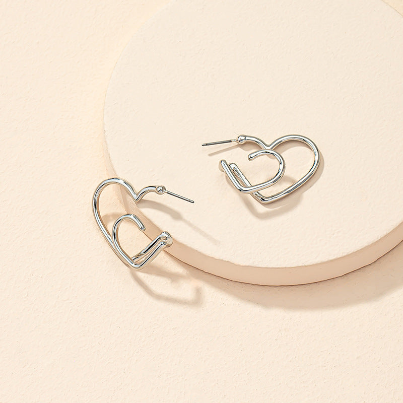 Peach Heart Asymmetrical Stud Earrings from Planderful Vienna Verve Collection