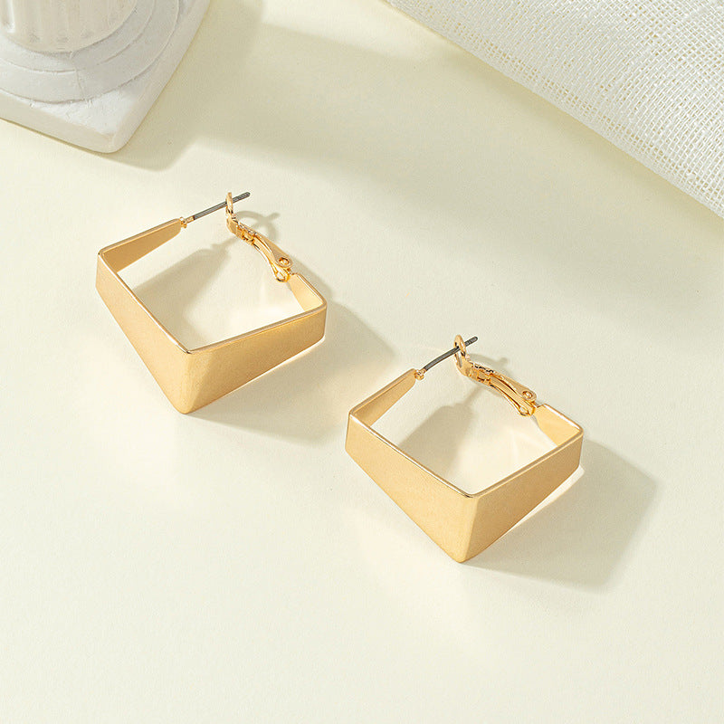 Geometric Retro Earrings with French Flair