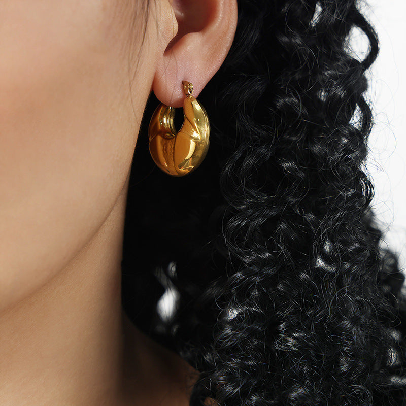 Golden Geometric High-Fashion Earrings with Unique Design