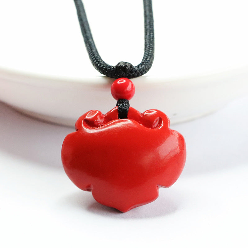 Cinnabar Stone Ruyi Lock Pendant with Red Sand Accents