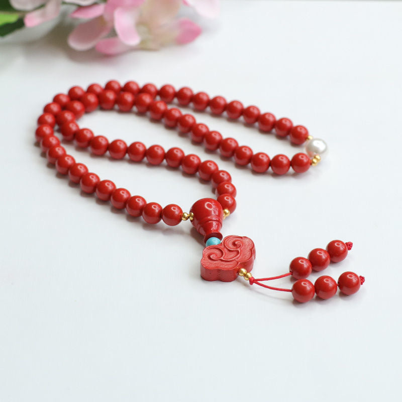 Auspicious Cloud Cinnabar Stone and Pearl Bracelet