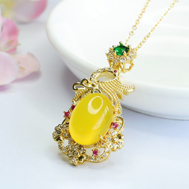 Yellow Phoenix Zircon Pendant Necklace with Chalcedony Egg