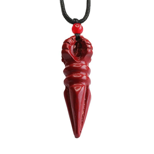 Pendant with Cinnabar Stone and Vajra Pestle Detail.