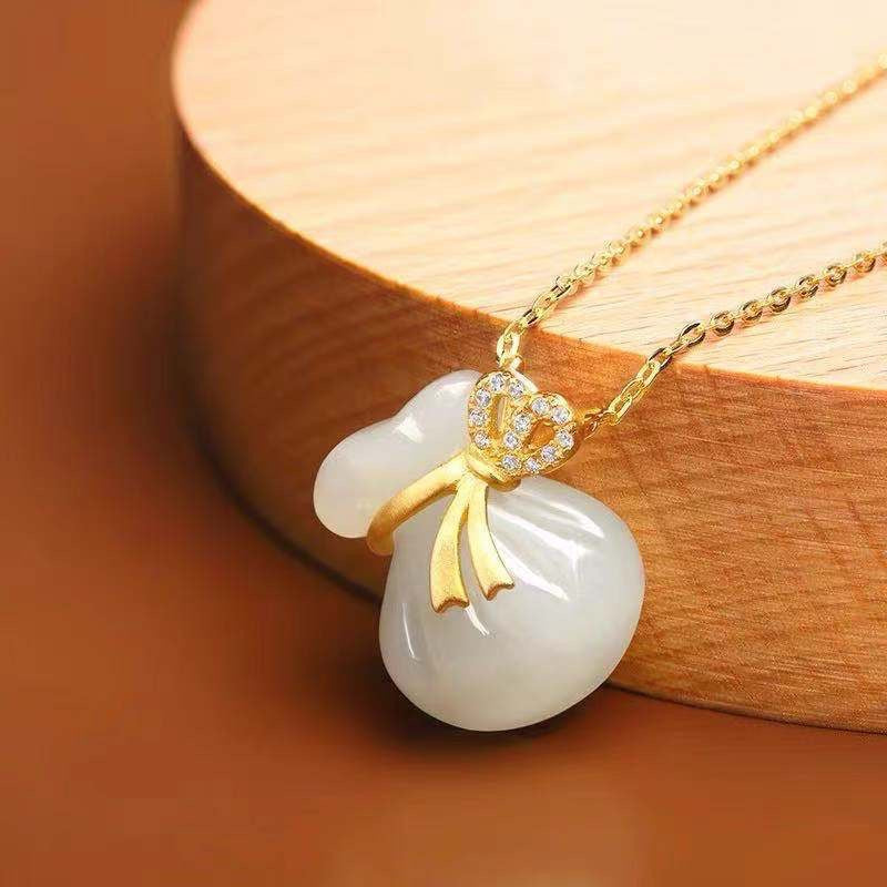 White Jade Lucky Money Bag Pendant Necklace with Zircon and Gold Accents