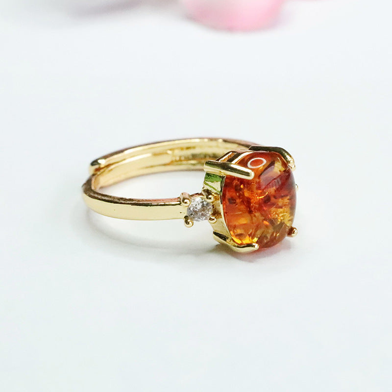 Elegant Sterling Silver Ring with Beeswax Amber Floral Detail