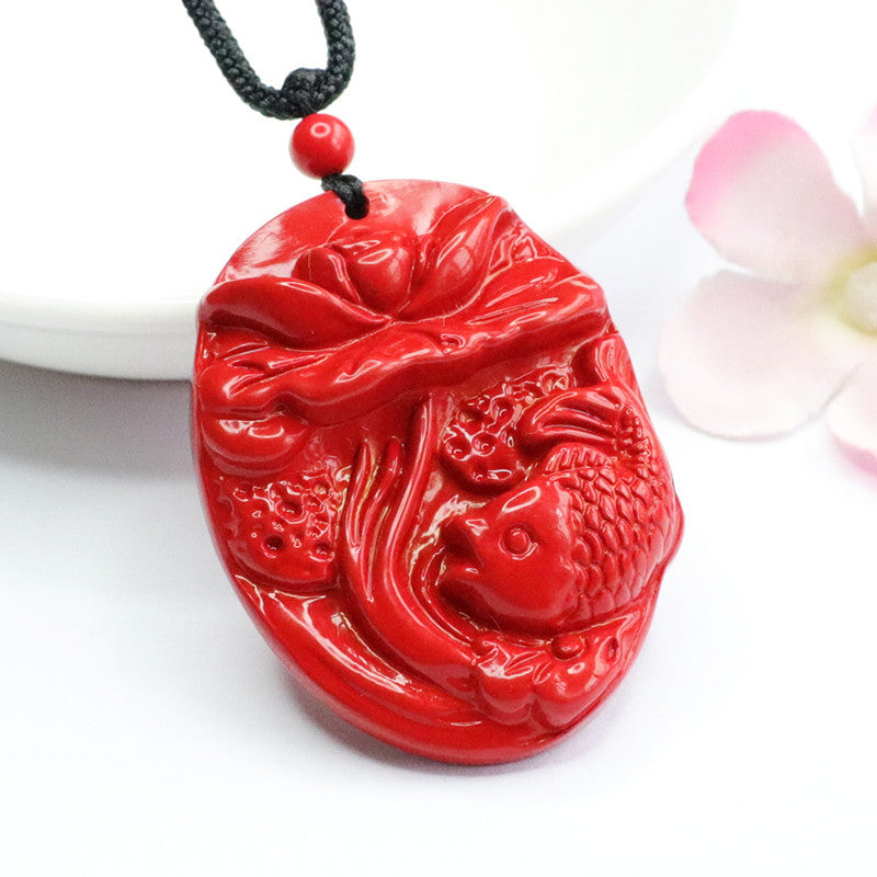 Cinnabar Lotus Fish Pendant with Red Sand