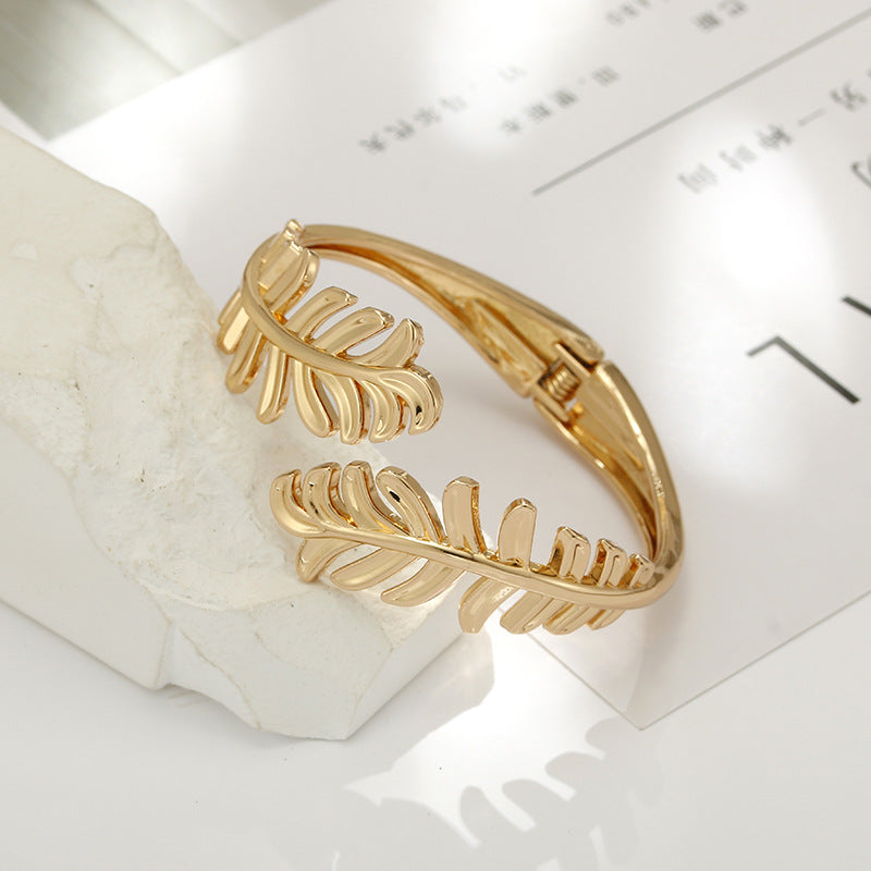 Leaf Design Gold Bracelet for Fashion-Forward Females - Vienna Verve Collection