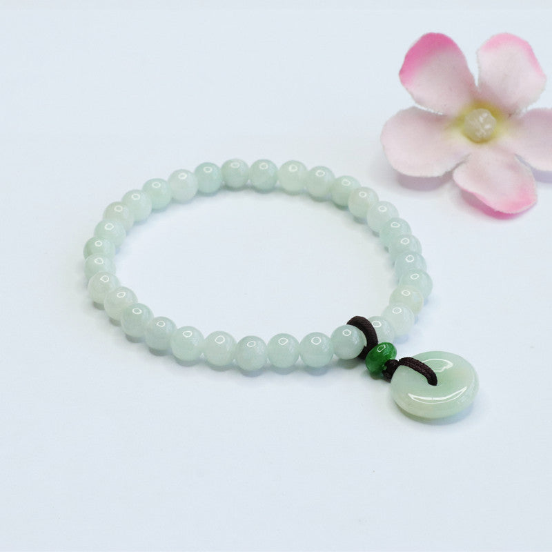 Light Green Jade Bracelet with Sterling Silver Safety Buckle and Tassel Detail