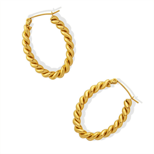 Golden Twist U-Shaped Earrings with Geometric Design