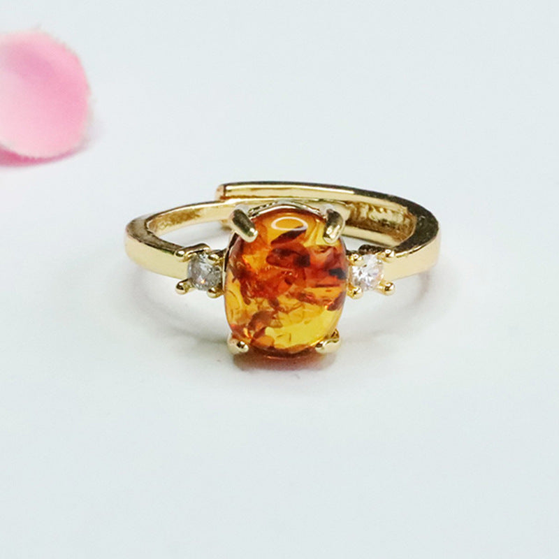 Elegant Sterling Silver Ring with Beeswax Amber Floral Detail