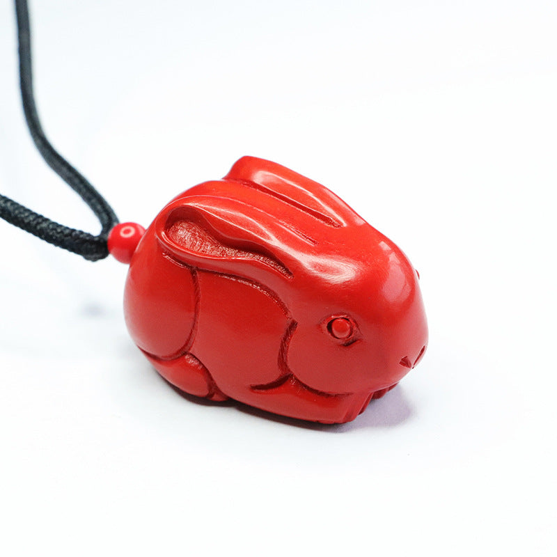 Cinnabar Rabbit Pendant with Red Sand Insets