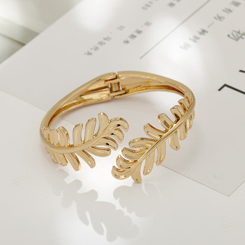 Leaf Design Gold Bracelet for Fashion-Forward Females - Vienna Verve Collection