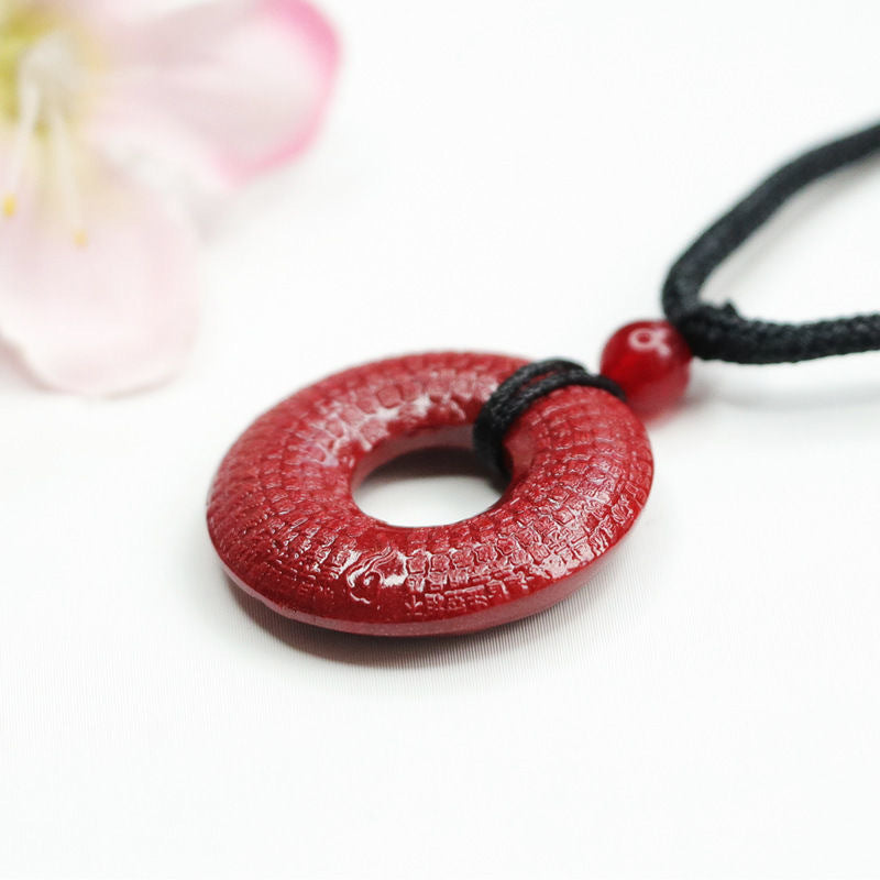 Auspicious Cloud Ping An Buckle Pendant with Cinnabar Stone featuring Purple Gold Sand.