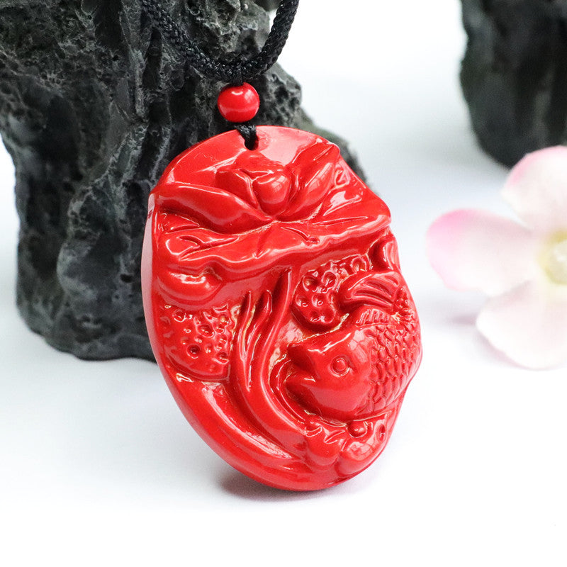 Cinnabar Lotus Fish Pendant with Red Sand