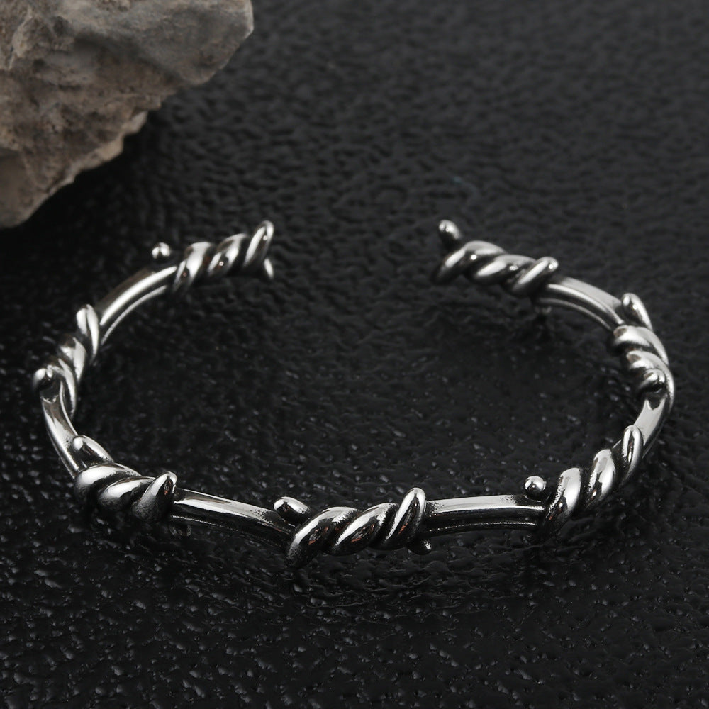 Titanium Steel Men's Winding Bracelet - Edgy Thorn Design for Contemporary Style