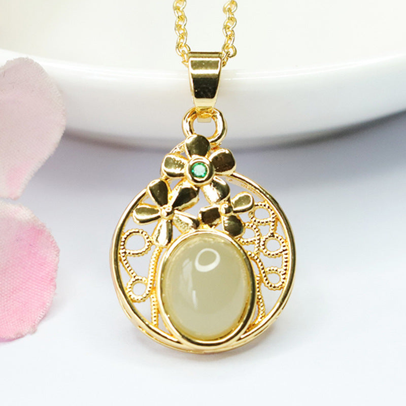 Elegant Hetian Jade Pendant with Sterling Silver Hollow Flower Design