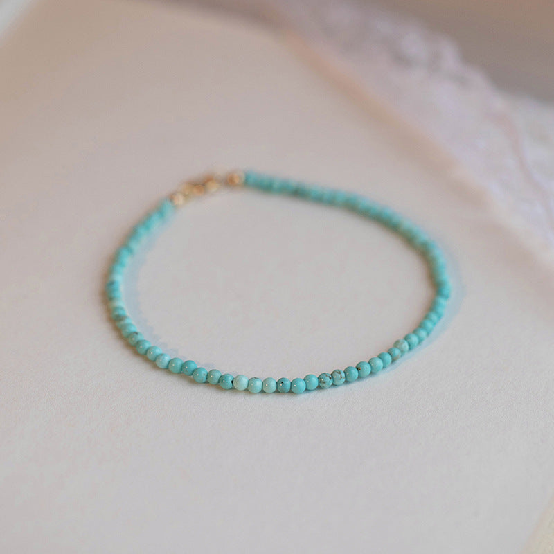 Fortune's Favor: Sterling Silver Bracelet with Turquoise and Malachite Beads