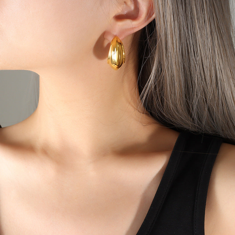 C-Shaped Textured Earrings in Gold Plated Titanium Steel