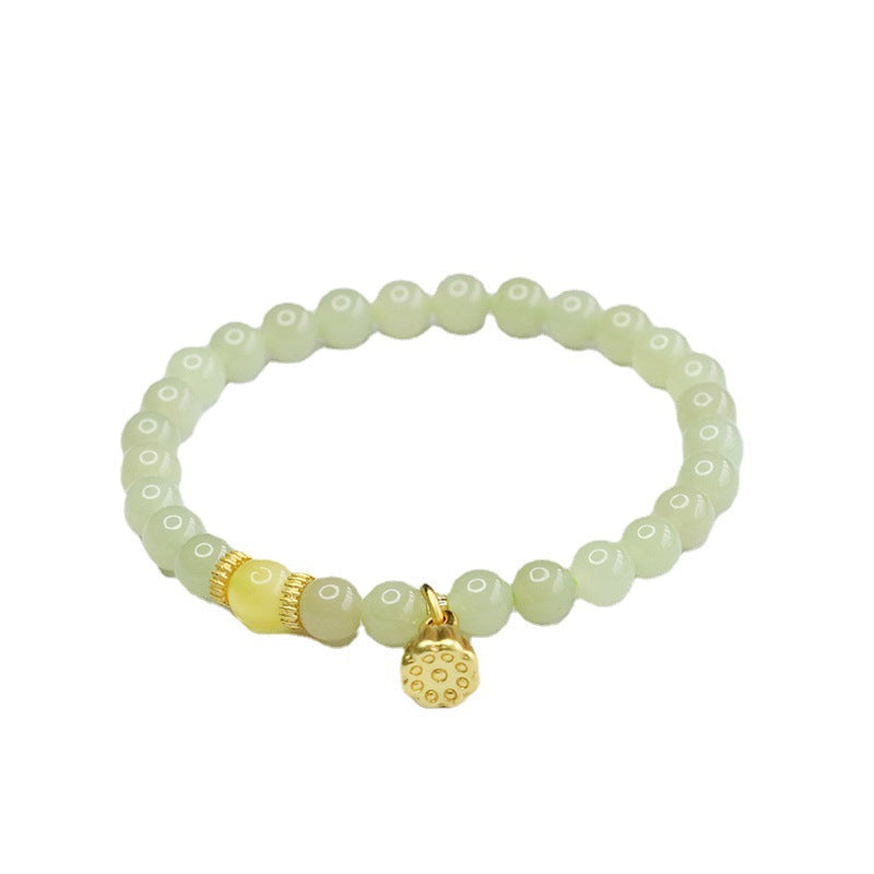 Honey Wax Lotus Seedpod Jade Bracelet with Sterling Silver Sailor String