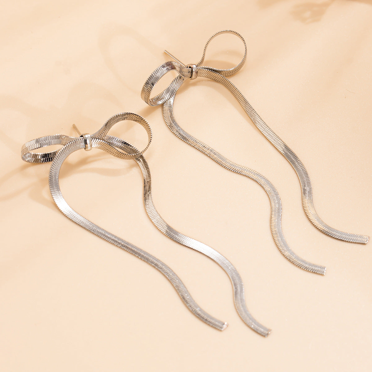 European and American Bow Earrings with Metal Ribbon Knots - Sterling Silver NeedleMaterials