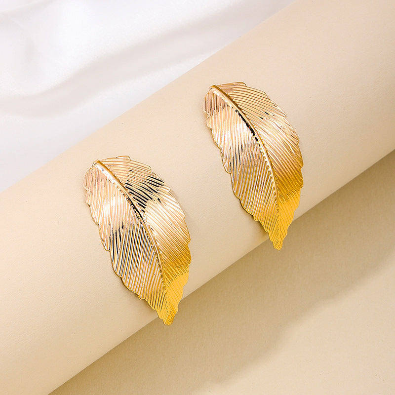 Feathered Metal Leaf Earrings with a Vintage Vibe