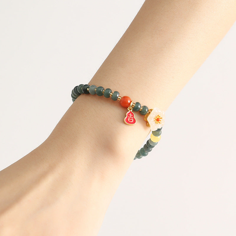 Fortune's Favor S925 Silver and Natural Jade Beaded Bracelet with Small Peach Blossom Design