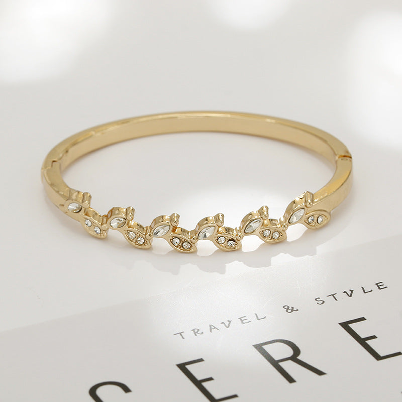 Enchanting Vienna Verve Alloy Bracelet with Custom Leaf Design