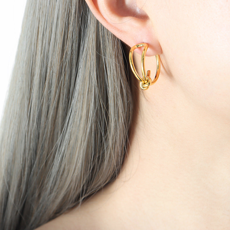 Golden Titanium Steel Rope Knot Earrings with a Twist of Elegance