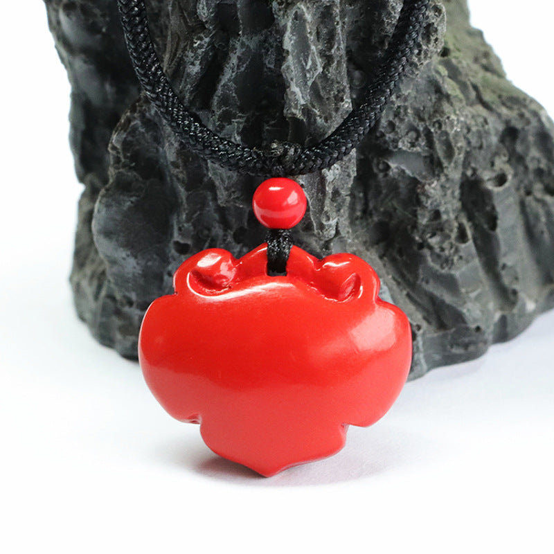 Cinnabar Stone Ruyi Lock Pendant with Red Sand Accents